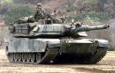 A M1A1 (Abrams Main Battle Tank) enters the Twin Bridges training area prepared for a mock battle in the Republic of Korea Nov. 2, 1998..jpeg